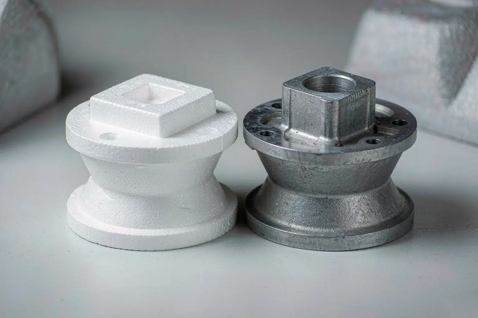 lost foam casting pour of molten aluminium into a coated foam cluster buried in dry unbonded sand