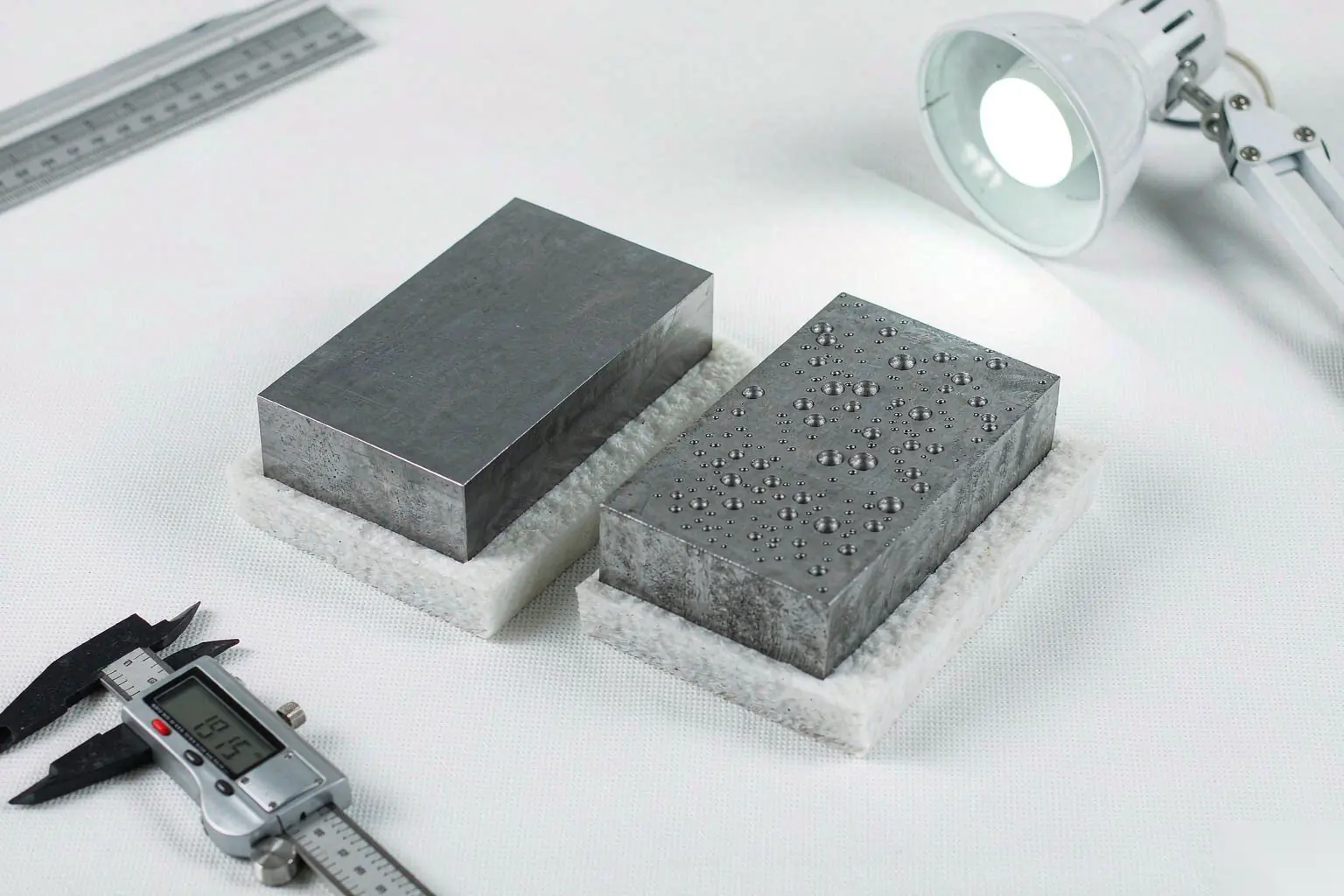 squeeze casting sectioned aluminum casting showing dense fine grain structure versus porous die casting