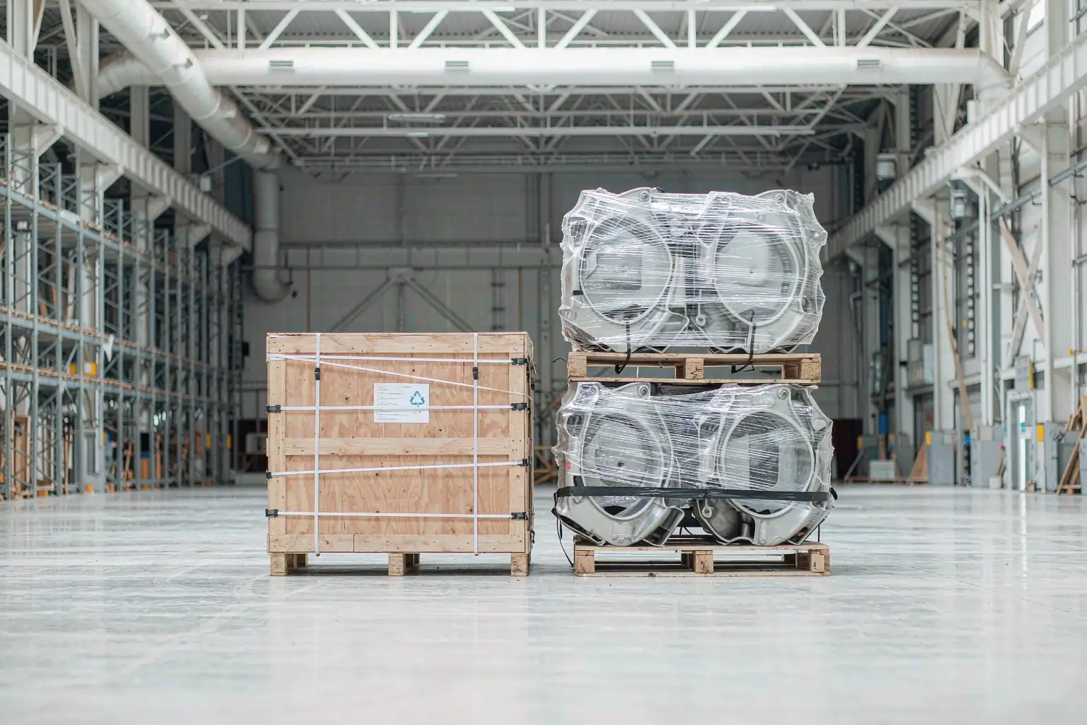 casting packaging shipping marks and barcode label on a strapped crate of metal castings